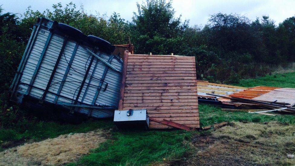 A destroyed pony shelter.