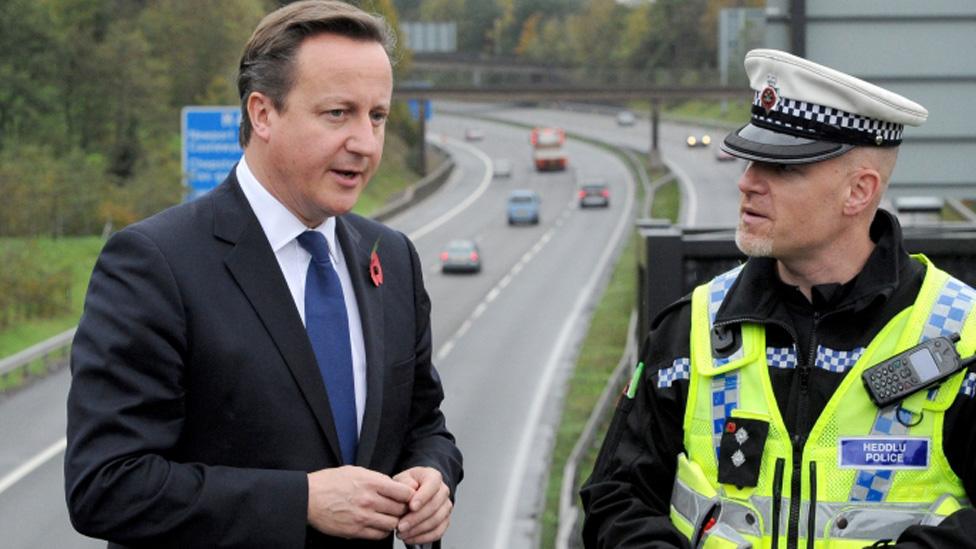 Mr Cameron meets with Traffic Police Inspector Rob Gwynne-Thomas overlooking the M4