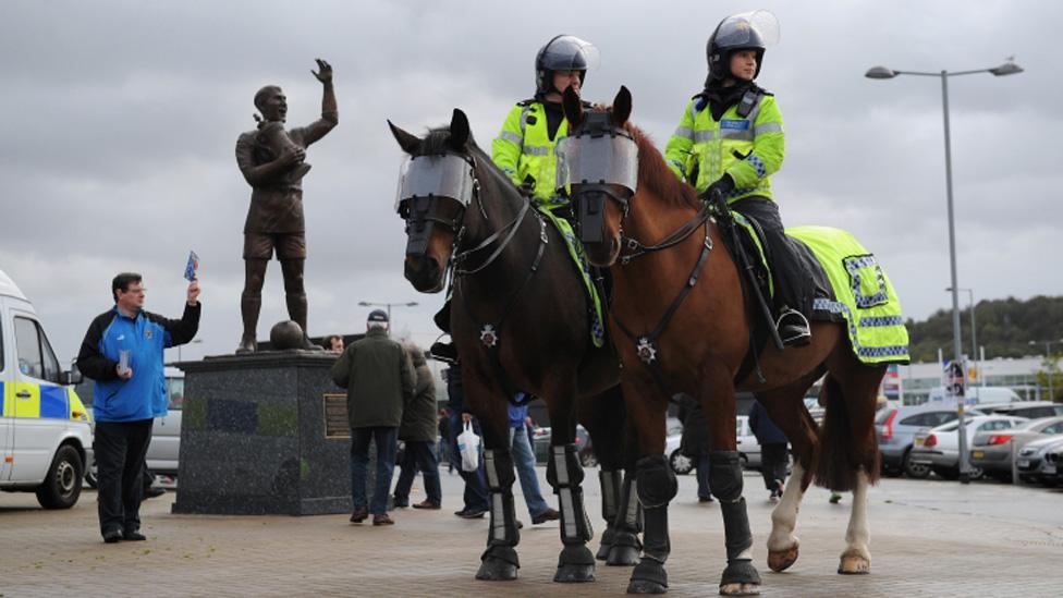 Police on duty before the match