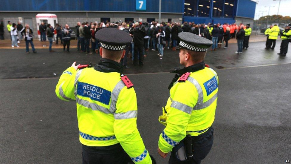 Police on duty before the match