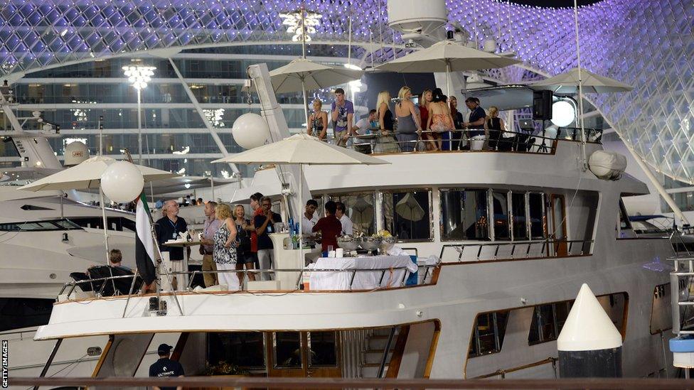 Spectators party on a yacht during the second practice session at the Abu Dhabi Grand Prix