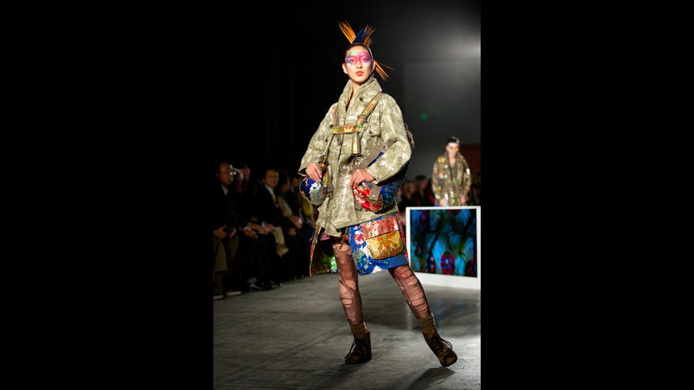 A model on the catwalk during Fashion in Motion: Kansai Yamamoto at the V&A, London, 1 November 2013.