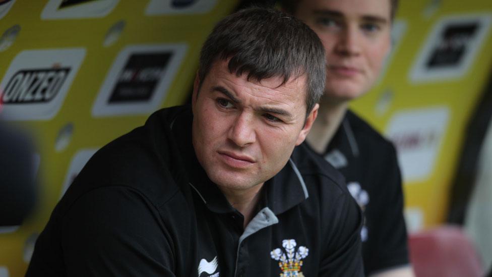 Iestyn Harris watches Wales from the dugout