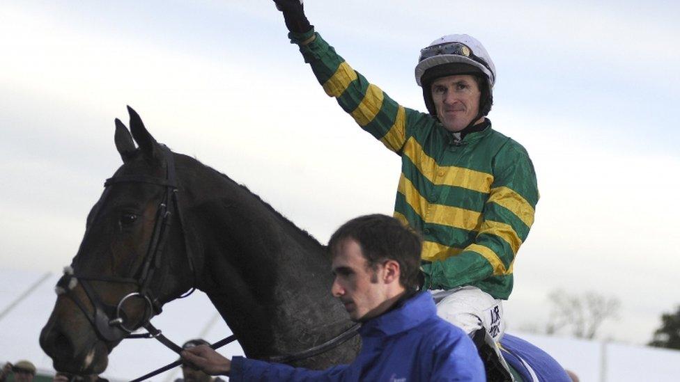 Tony McCoy celebrates his win