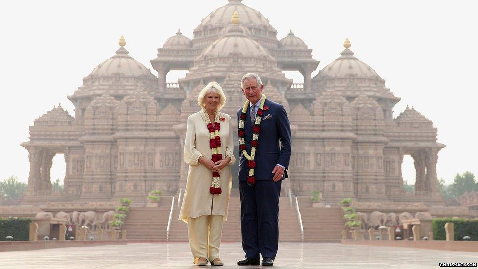 Camilla, Duchess of Cornwall and Prince Charles, Prince of Wales pose outside the Akshardham Temple in Delhi