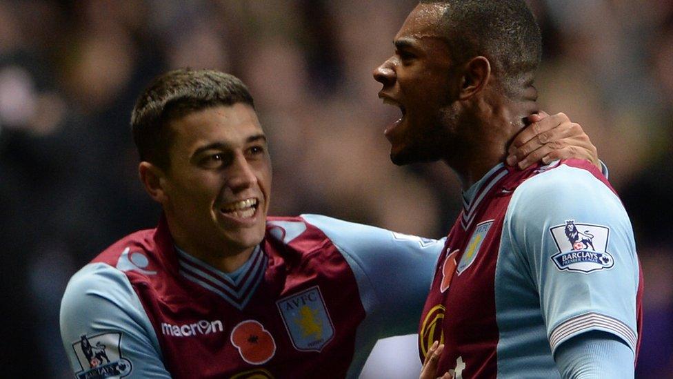 Leandro Bacuna (right) celebrates with Matthew Lowton