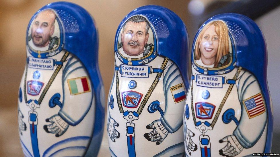 Russian dolls with astronauts face on them