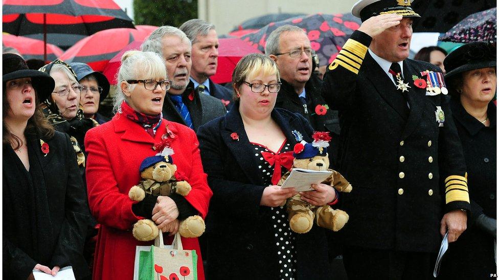 Dorothy Bernall, 54 (2nd left) and Sally Clough, 29 (3rd right) during Armistice Day commemorations at the Armed Forces Memorial, National Memorial Arboretum, Alrewas, Staffordshire