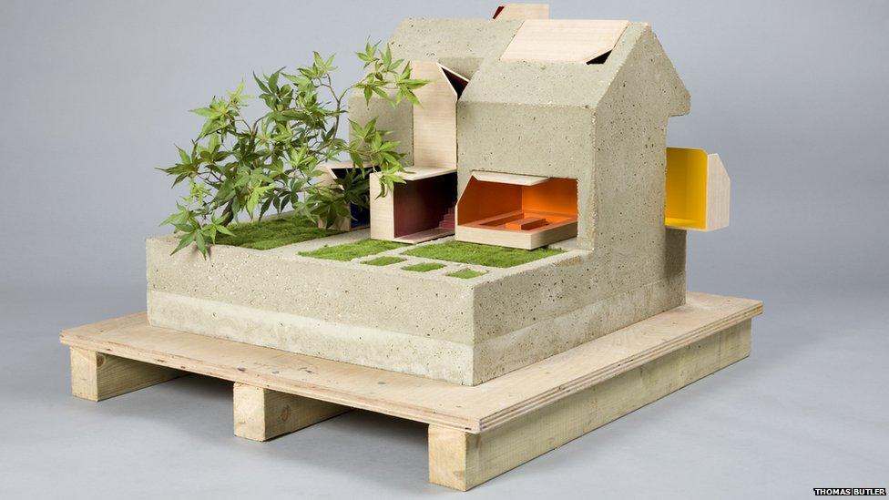 Concrete and wood dolls house