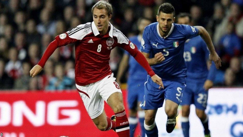 Italy's Thiago Motta, right, and Denmark's Christian Eriksen during the 2014 World Cup Group B qualifying match between Denmark and Italy