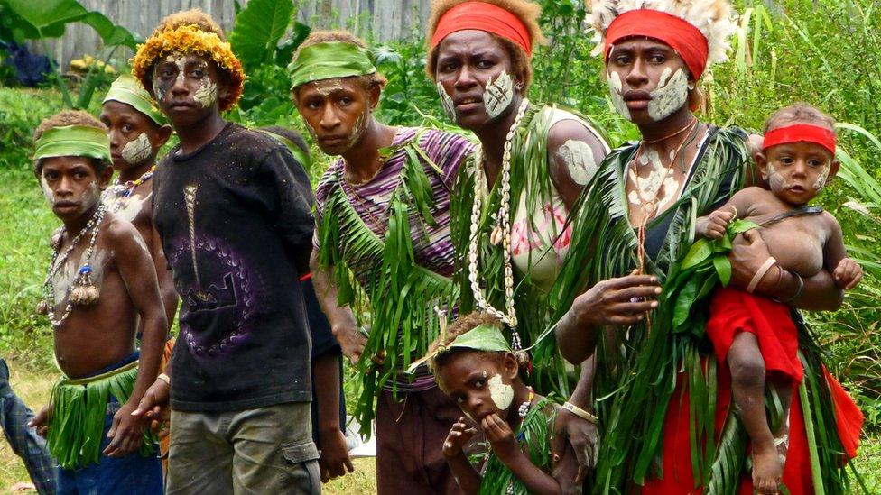 Supporters waiting for the baton to arrive in Papua New Guinea's New Ireland province