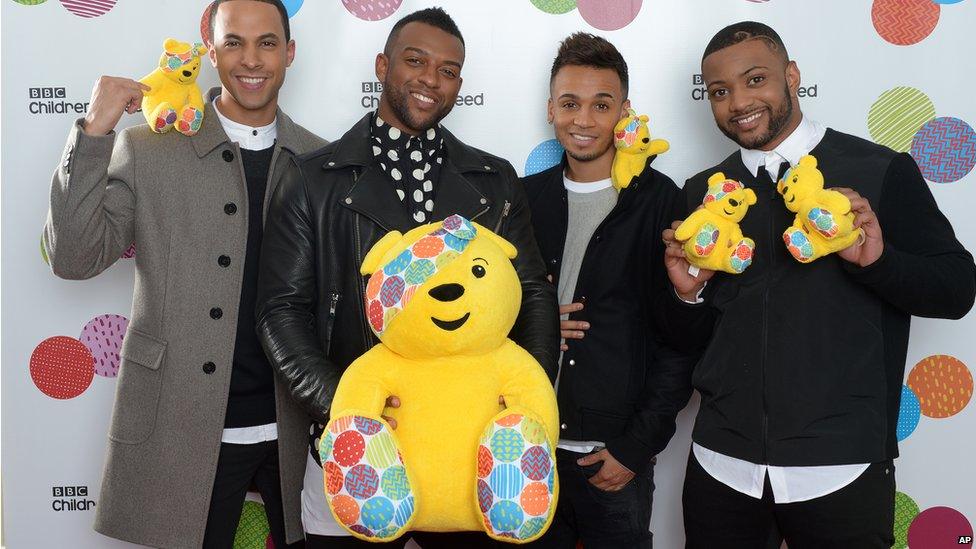 JLS, backstage, with Pudsey bears