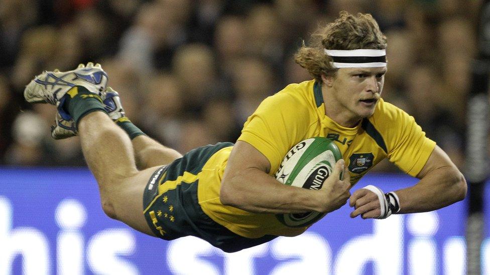 Australia's Nick Cummins scores a try against Ireland during the international at the Aviva Stadium