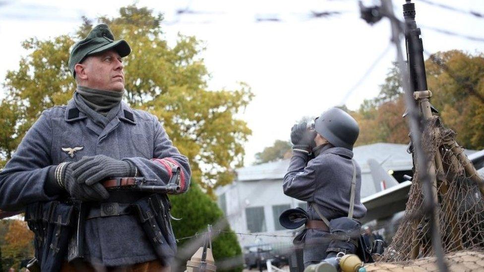 Jason Littleford (left) portrays a German Home Guard at a Military Vehicles Day.