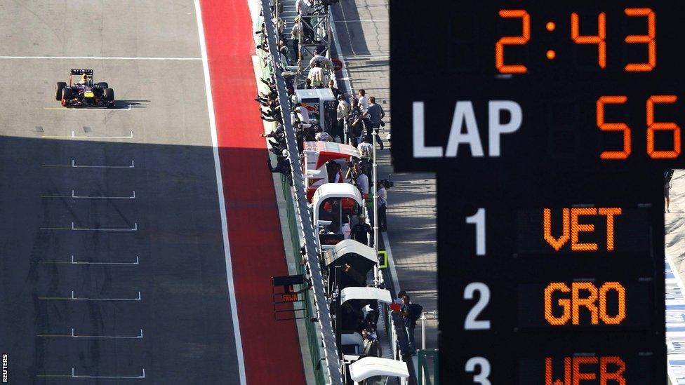 Sebastian Vettel crosses the line to win the United States Grand Prix