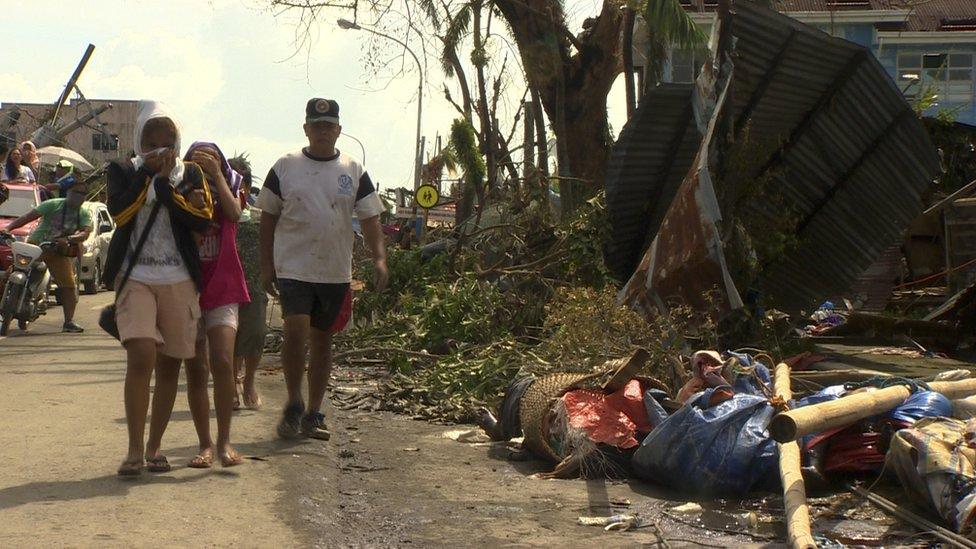 Bodies laying by the roadside in Tacloban, a city devastated by Typhoon Haiyan, in Leyte, central Philippines