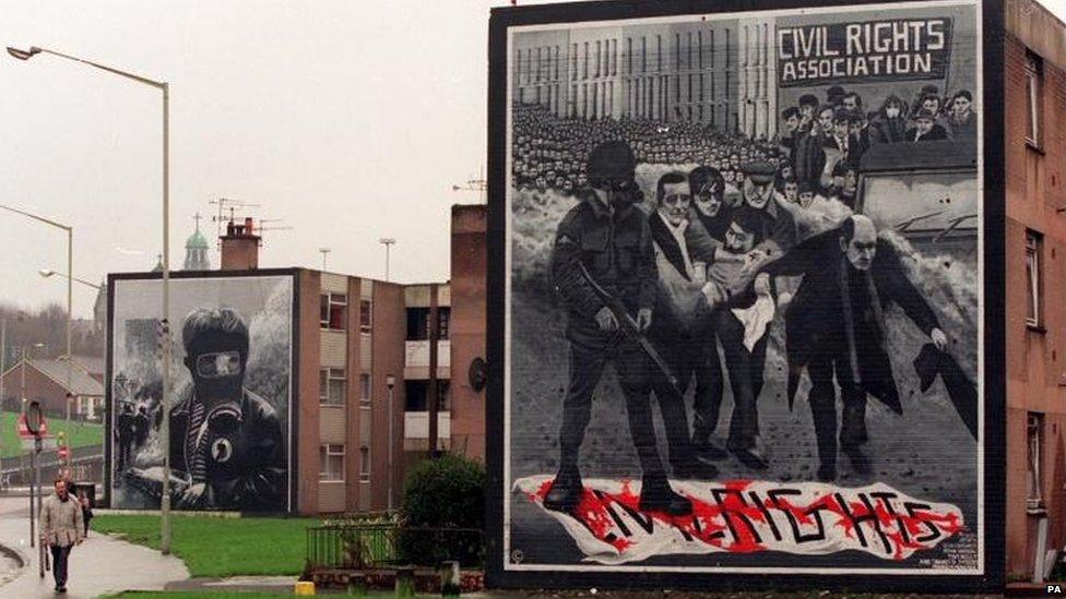 Murals at Free Derry Corner in Londonderry showing scenes from Bloody Friday