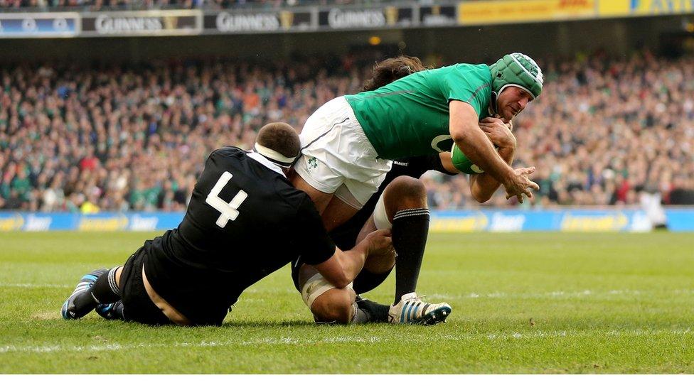 Ireland hooker Rory Best stretches to score the second try of a drama-filled match against the world champions