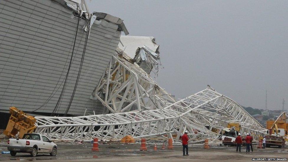 Officials inspect the damage