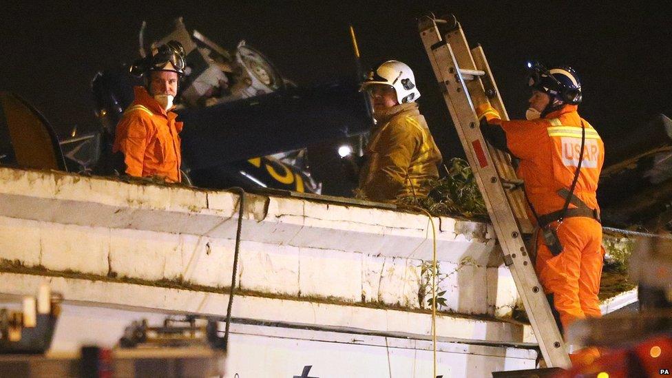 Rescue workers at scene of Glasgow crash