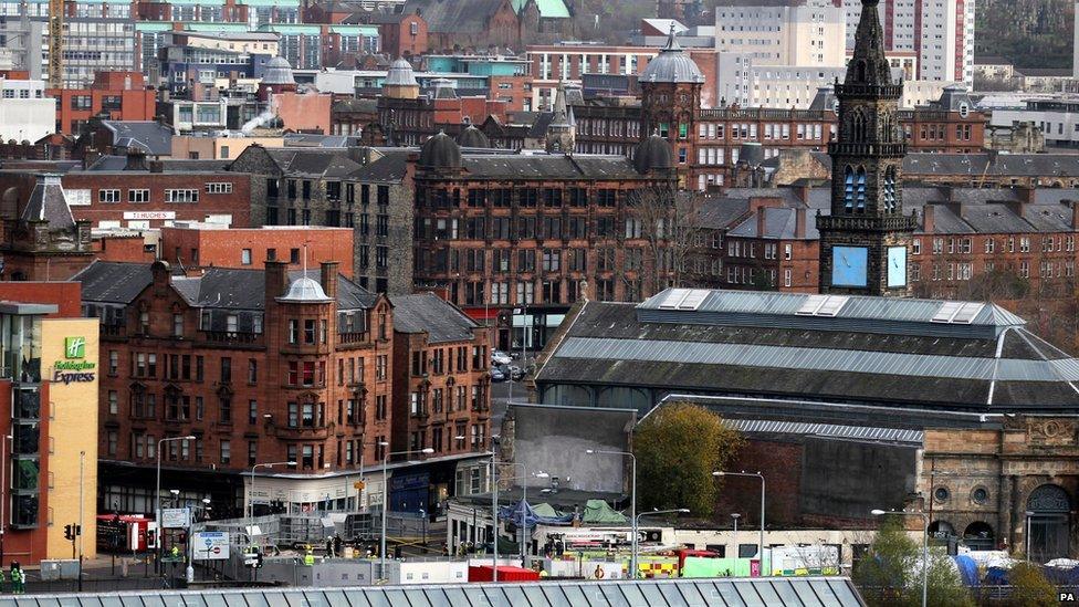 Emergency services at the Clutha Bar (bottom centre) in Glasgow where a police helicopter crashed.