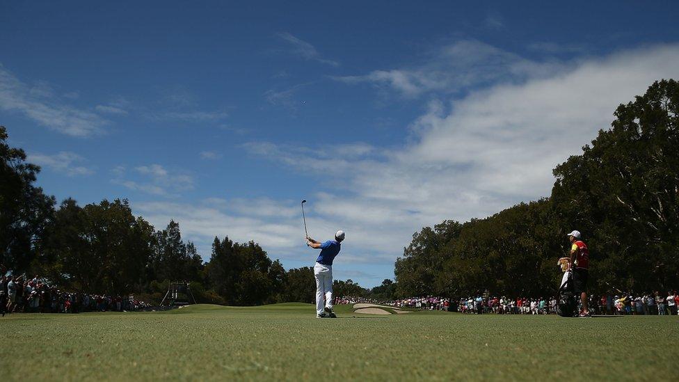 Rory McIlroy plays an approach shot during the final round which ended with the Northern Irishman pipping Adam Scott to the title by one shot