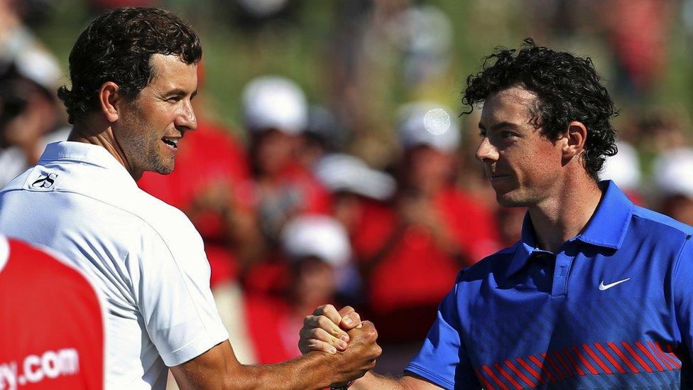 Australian Adam Scott shakes hands with winner Rory McIlroy after their exciting tussle for the Stonehaven Cup