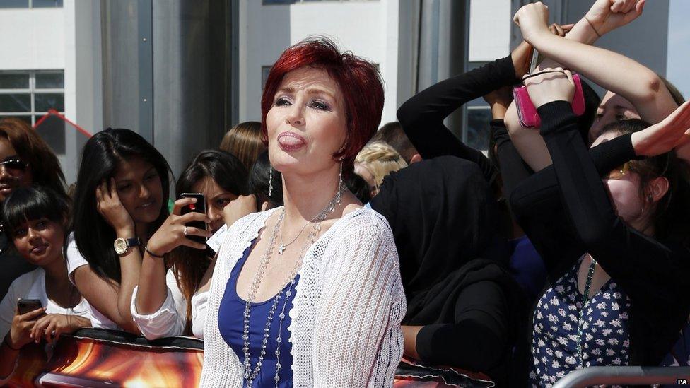 Sharon Osbourne sticking her tongue out
