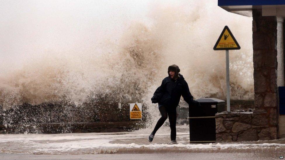 A Woman by a wave in Rhyl