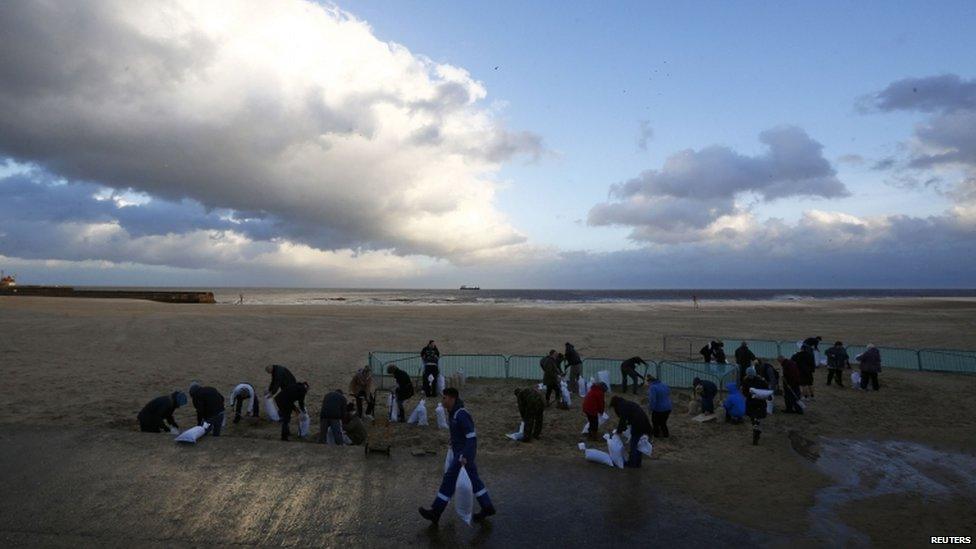 People filling sandbags in Gorleston-on-Sea