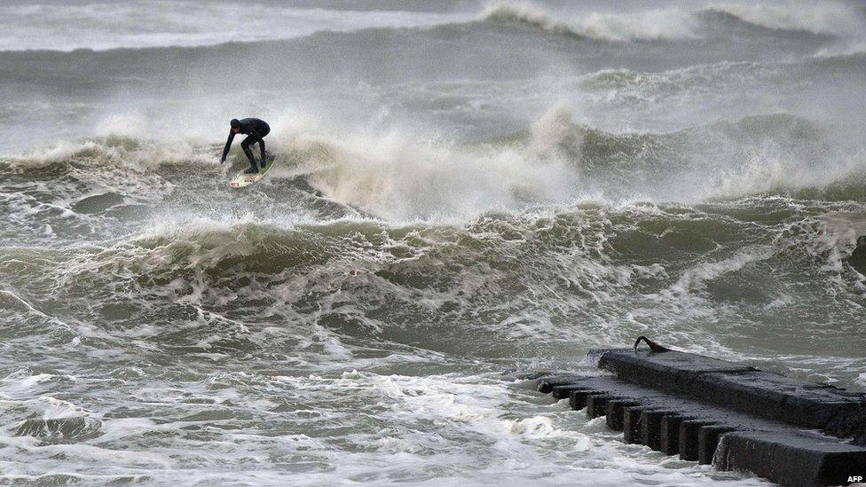 Surfer in the storm, Hanstholm, northern Jutland, Denmark (5 Dec)