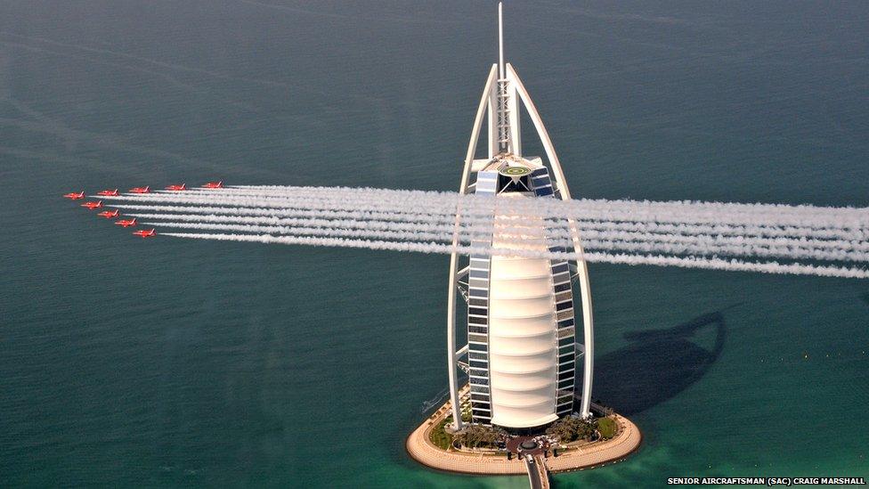 Red Arrows flying past the Burj Al Arab hotel in Dubai