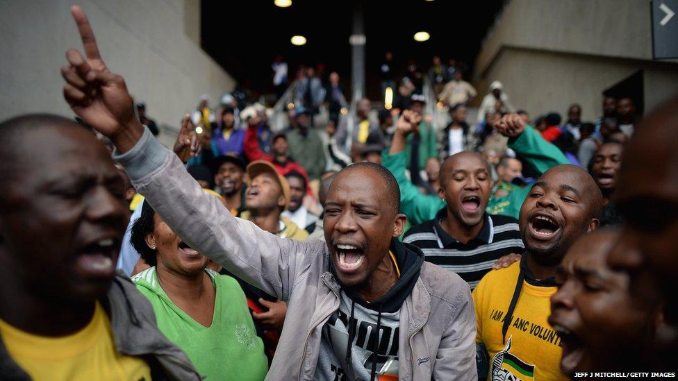 Members of the public arrive for the Nelson Mandela memorial