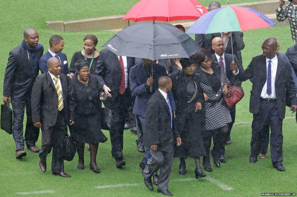 The former wife of Nelson Mandela, Winnie Madikizela-Mandela, center right, arrives