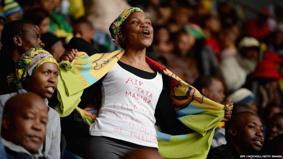 Members of the public attend the Nelson Mandela memorial service