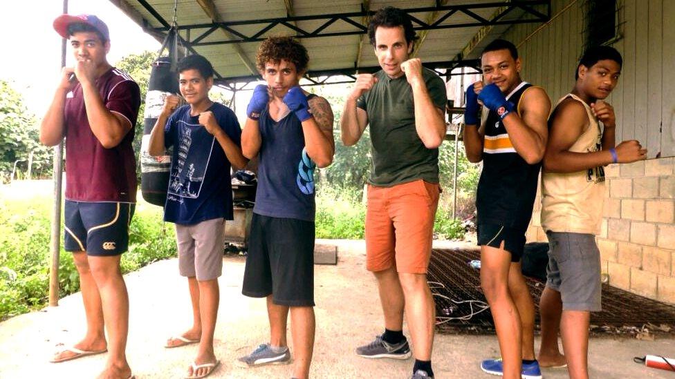 BBC Queen's Baton Relay presenter Mark Beaumont poses with Tonga's young boxing hopefuls