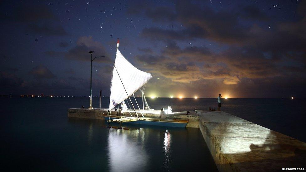 A sailing canoe sits in dock ahead of the Queen's Baton's next adventure in Tarawa, Kiribati.