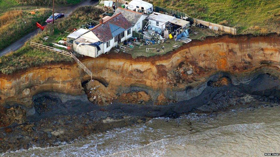 The last house on the cliff at Happisburgh needs to be demolished following the tidal surge