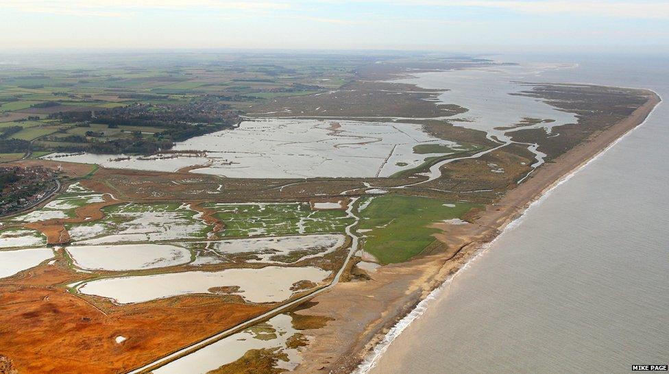 Flooded marshland at Salthouse looking towards Blakeney