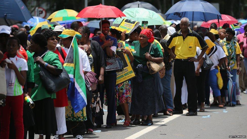 Thousands of people are waiting to view the former president as he lies in state at Union Buildings