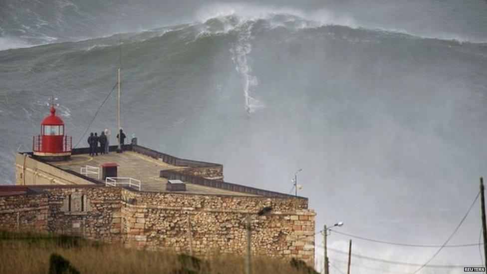Garrett McNamara rides huge wave