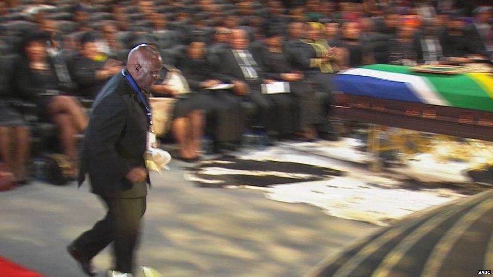 Former President of Zambia Kenneth Kaunda jogs to the podium