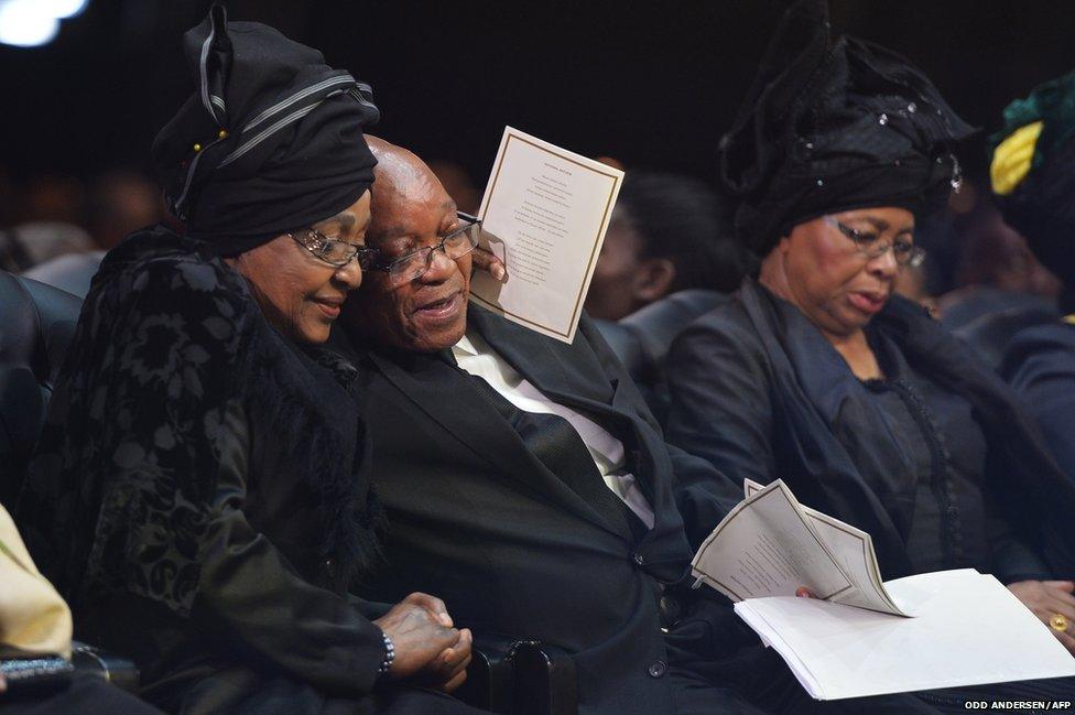 Winnie Madikizela-Mandela, Nelson Mandela's former wife, hugs South African President Jacob Zuma