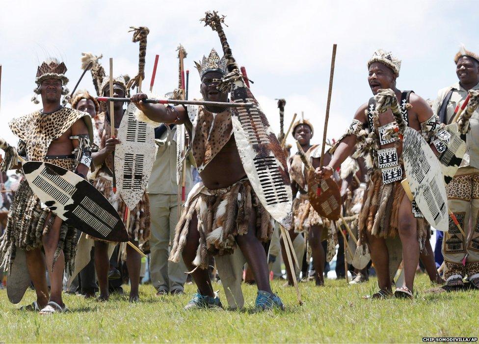 Zulu men perform a traditional dance