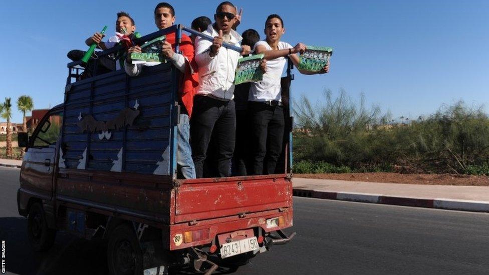 Raja Casablanca fans make their way to the stadium by pick up truck before the Fifa Club World Cup Final between Raja Casablanca and FC Bayern Munich at the Marrakech Stadium