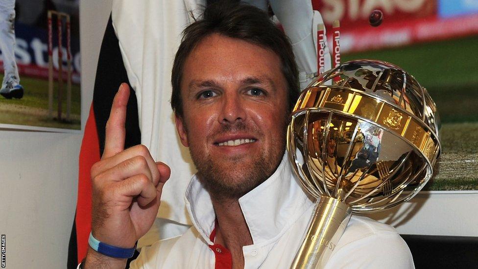 22 Aug 2011: Graeme Swann of England celebrates the series victory with the ICC Test Championship Mace in the dressing room as England become the number one ranked team during day five