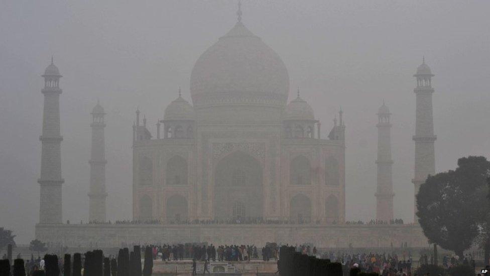 Fog envelops the monument Taj Mahal in Agra