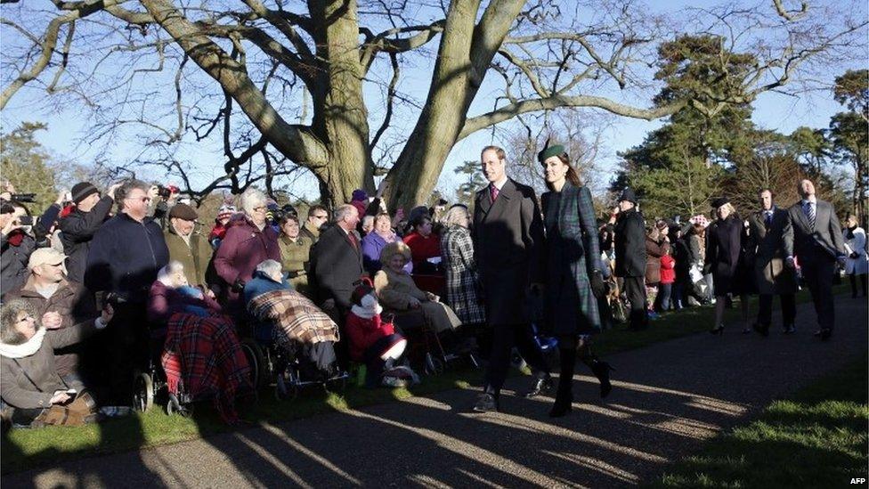 Prince William and his wife Catherine, Duchess of Cambridge, arrive for a traditional Christmas Day Church Service at Sandringham in eastern England, on 25 December 2013.