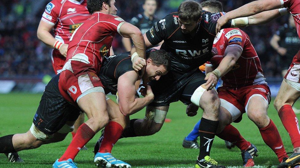 Ospreys lock Ian Evans heads for the try line