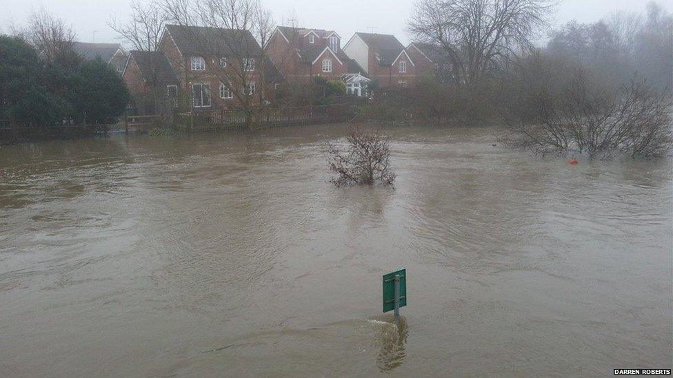 The River Wey has burst its banks.